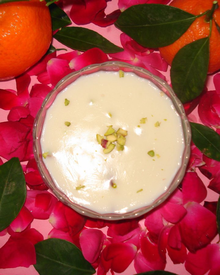 Muhallabia with pistachio among rose petals